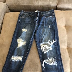 Distressed skinny jean with frill ankle!